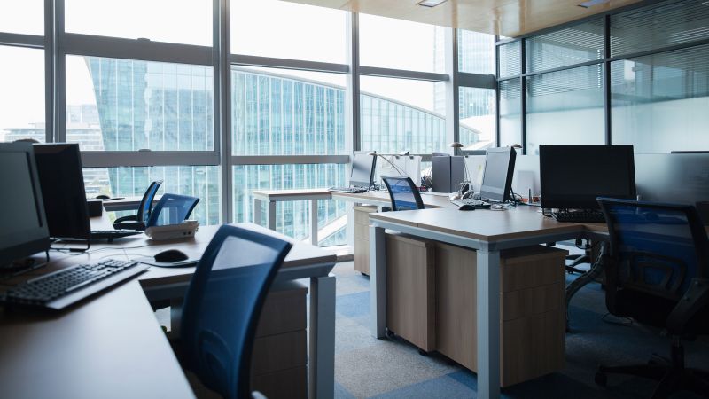 Empty office workspace amid AI-driven job changes
